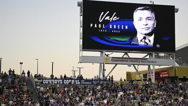 Cowboys fans share a minute silence for Paul Green.