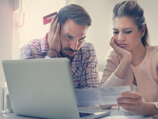 A couple having problem with bills and money. Generic relationships, laptop, expenses. Picture: iStock.