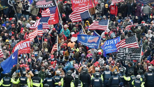 Trump supporters clash with police and security forces as they storm the US Capitol. Picture: AFP.