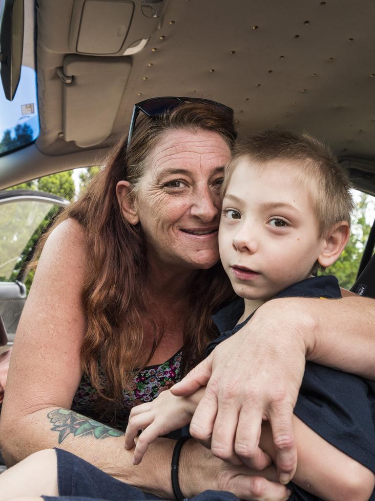 Jax and mum Deanne Carey in their 2004 Holden Commodore donated by Cheap Cars Toowoomba. Picture: Kevin Farmer