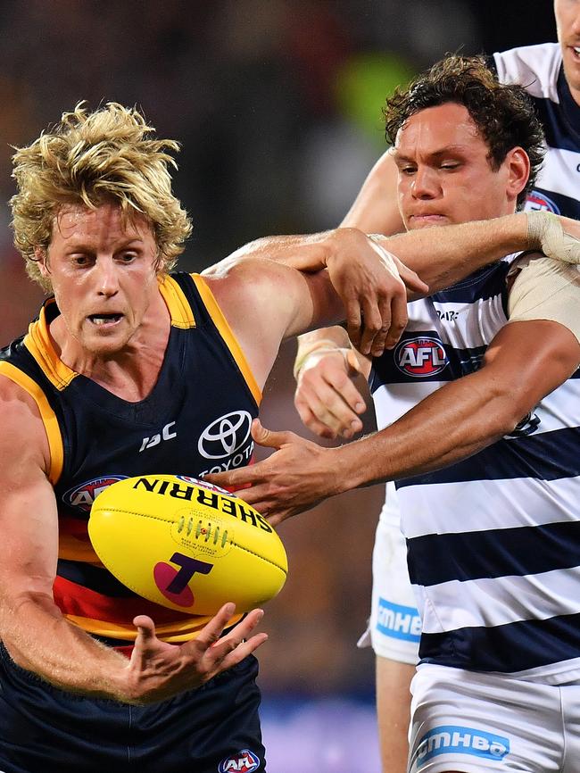 Steven Motlop tackles Rory Sloane in this year’s preliminary final. Picture: Daniel Kalisz/Getty Images