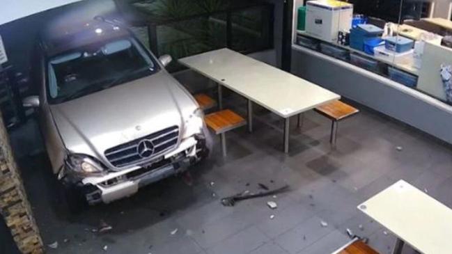 The moment the Mercedes crashed into the restaurant.