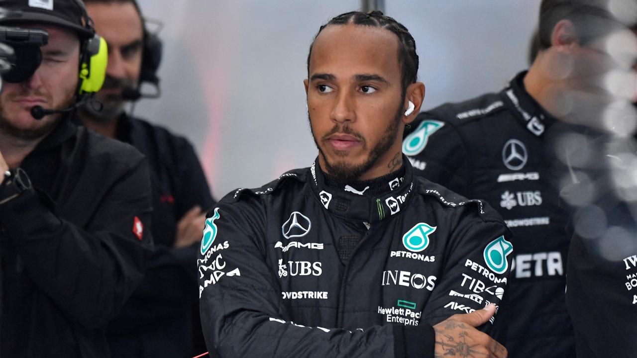 Mercedes' British driver Lewis Hamilton waits ahead of the qualifying session for the Belgian Formula One Grand Prix at Spa-Francorchamps racetrack in Spa, on August 27, 2022. (Photo by Geert Vanden Wijngaert / POOL / AFP)