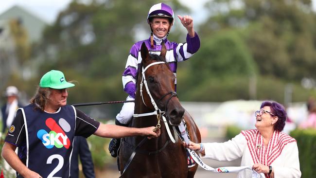 Nash Rawiller and Riff Rocket are led back by owner Debbie Kepitis (right) after their win in the Rosehill Guineas. Picture: Getty Images