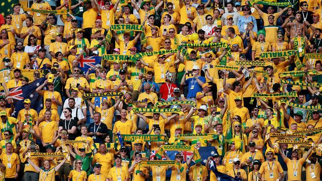 Austrian fans stand for the national anthem during the Socceroos v Peru match at Fisht Stadium in Sochi during the 2018 World Cup in Russia. Picture: Toby Zerna