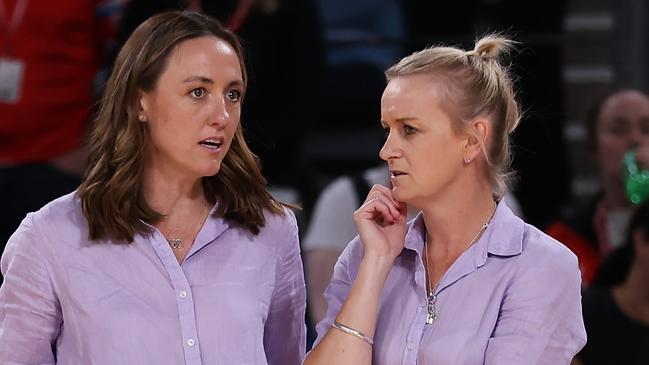 SYDNEY, AUSTRALIA - APRIL 01: Head Coach Bec Bulley and Assistant Coach Lauren Brown of the Firebirds talk after the game during the round three Super Netball match between NSW Swifts and Queensland Firebirds at Ken Rosewall Arena, on April 01, 2023, in Sydney, Australia. (Photo by May Bailey/Getty Images)