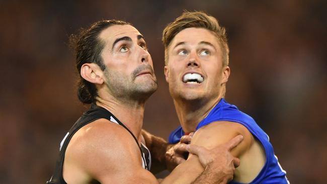 First-year Demons Brodie Grundy and Josh Schache are both in the frame for a recall with Jacob van Rooyen suspended for the semi-final. Picture: Julian Smith / AAP