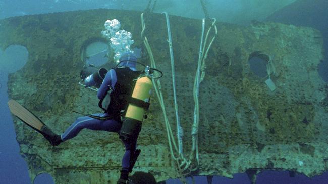 This 1998 image provided by RMS Titanic, Inc., shows a 17-ton portion of the hull of the RMS Titanic as it is lifted to the surface during an expedition to the site of the tradegy. The piece along with 5,000 other artifacts will be auctioned as a single collection on April 11, 2012 100 years after the sinking of the ship. (AP Photo/RMS Titanic, Inc.)