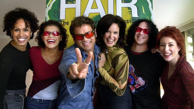 Underwood (far right) at the cast announcement for Hair in 2001. The production was cancelled before it opened.