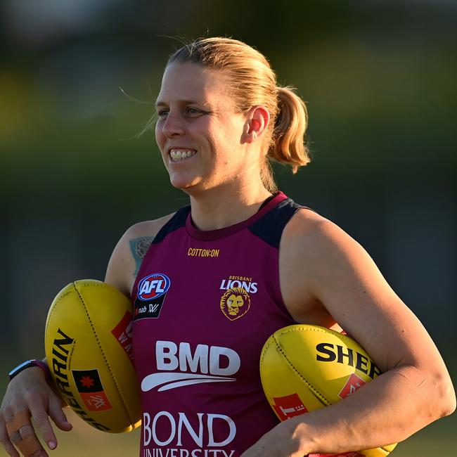 Champion Brisbane defender Kate Lutkins will present the cup to the Lions after announcing her retirement on Tuesday. Picture: Albert Perez / Getty Images