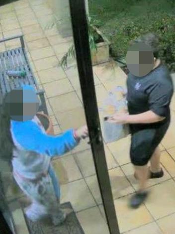 The girl at the front door of her home helps with the family shopping. Photo: NSW Police /