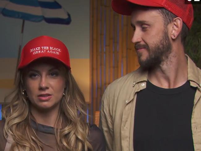 Kristy and Brett in Donald Trump-style hats. Because, of course.