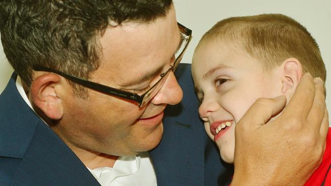 Andrews with young Cooper Wallace, the face of legalising medical marijuana. Picture: Carmelo Bazzano