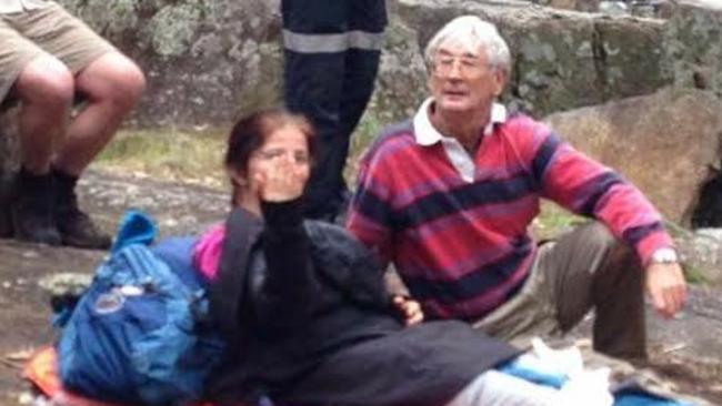 Millionaire adventurer Dick Smith with a woman bushwalker who he helped rescue in the Blue Mountains on the weekend.