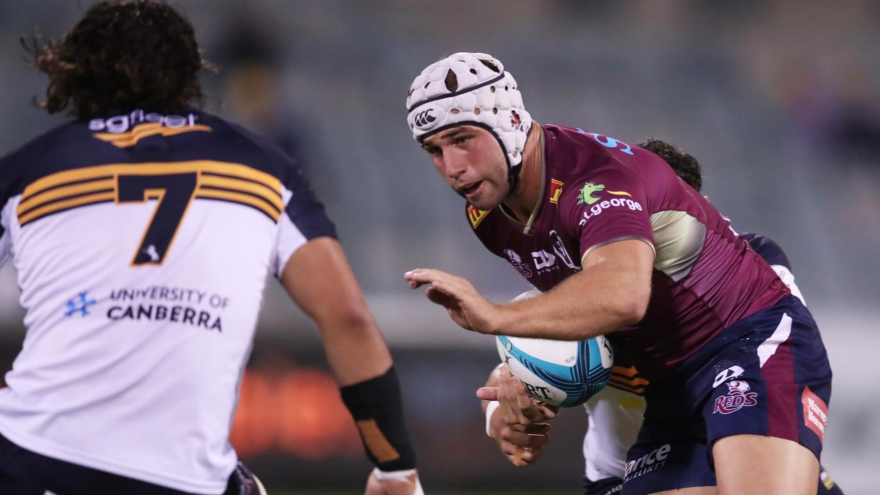 CANBERRA, AUSTRALIA – MARCH 18: Hamish Stewart of the Reds takes on the defence during the round five Super Rugby Pacific match between the ACT Brumbies and the Queensland Reds at GIO Stadium on March 18, 2022 in Canberra, Australia. (Photo by Matt King/Getty Images)