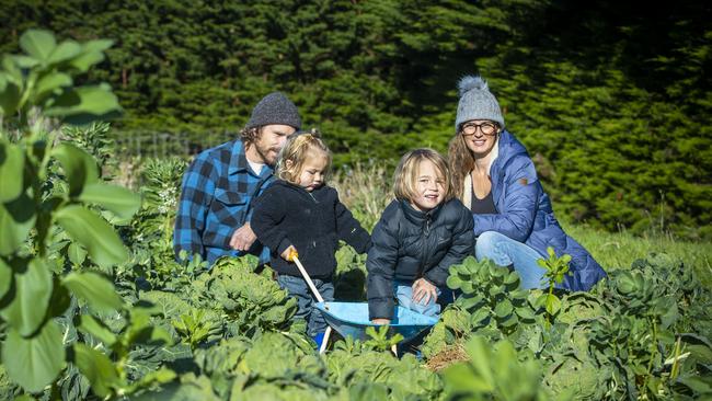 (L-R) Rebecca Kelley, with children, August, 2 and Frank Mausz, 4 and partner Fred Mausz at the Bream Creek Community Garden., Picture: LUKE BOWDEN