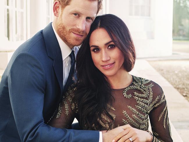 Prince Harry and Meghan Markle, in a Ralph &amp; Russo dress, pose for engagement photos at Frogmore House, in Windsor, England. Picture: Alexi Lubomirski via AP