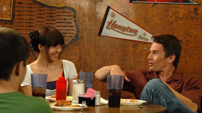 In this image released by IFC Films, from left, Ellar Coltrane, Lorelei Linklater and Ethan Hawke appear in a scene from 