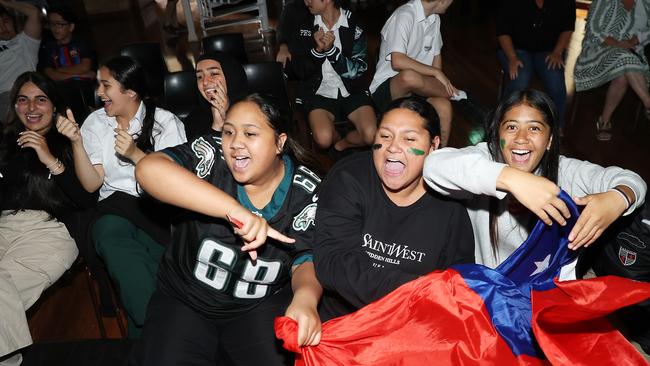 Condell Park High students cheer on former student Jordan Mailata during the Super Bowl on Monday. Picture: Jane Dempster