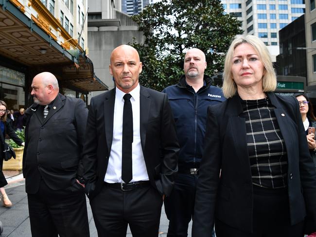 Former NSW Detective Gary Jubelin leaves the Downing Centre Courts in Sydney, Tuesday, July 30, 2019. NSW detective Gary Jubelin, who led the fresh search for three-year-old William Tyrell, is due to face a Sydney court on surveillance charges. (AAP Image/Joel Carrett) NO ARCHIVING