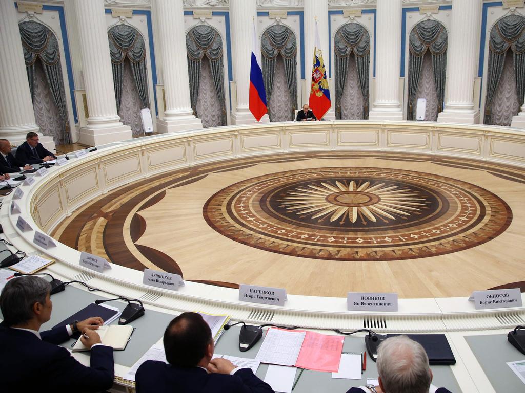 Russian President Vladimir Putin chairs a meeting with leadership of military-industrial complex enterprises at the Kremlin in Moscow.