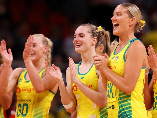 SYDNEY, AUSTRALIA - OCTOBER 30: The Australian players cheer as Amy Parmenter of Australia is presented the player of the match award during game two of the International Test series between the Australia Diamonds and the England Roses at Qudos Bank Arena on October 30, 2022 in Sydney, Australia. (Photo by Mark Kolbe/Getty Images for Netball Australia)