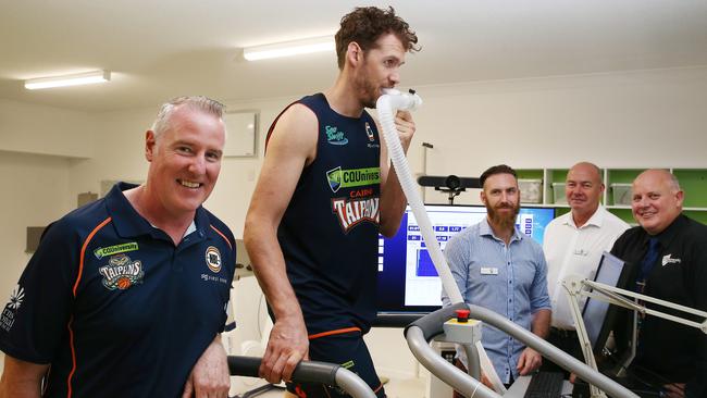 Cairns Taipans CEO Mark Beecroft, co captain Alex Loughton, CQUniversity Exercise and Sports Science Lecturer Dr. Joshua Guy, Head of Department Professor Tony Schneiders and Vice-Chancellor Professor Scott Bowman inspect the sports equipment that is link to precision instruments and computer analysis software. PICTURE: BRENDAN RADKE