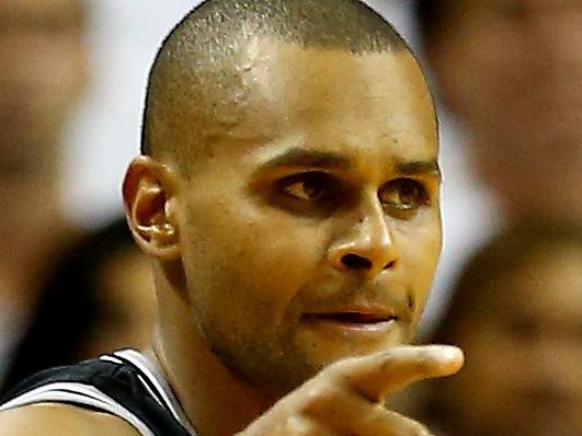 MIAMI, FL - JUNE 12: Patty Mills #8 of the San Antonio Spurs celebrates against the Miami Heat during Game Four of the 2014 NBA Finals at American Airlines Arena on June 12, 2014 in Miami, Florida. NOTE TO USER: User expressly acknowledges and agrees that, by downloading and or using this photograph, User is consenting to the terms and conditions of the Getty Images License Agreement. Andy Lyons/Getty Images/AFP == FOR NEWSPAPERS, INTERNET, TELCOS & TELEVISION USE ONLY ==