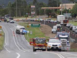 Emergency services attend a fatal car crash on the Warrego Highway at Hatton Vale. Picture: Tom Threadingham