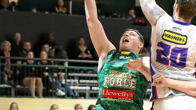 Ipswich Force basketballer Kane Bishop reaches for the basket in his QBL match against Toowoomba at Llewellyn Stadium. Picture: Megan Low