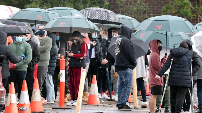 People line up at Epping hall to get tested for Covid-19 in the latest outbreak in Melbourne. Picture: NCA NewsWire/David Crosling