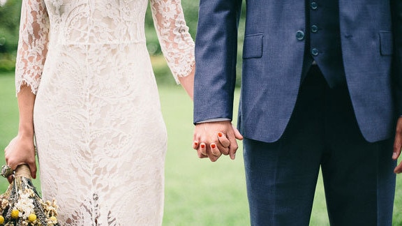 Couples will have to change their wedding plans after the federal government banned non-essential mass gatherings of 100 people indoors and 500 people outdoors for the next six months.