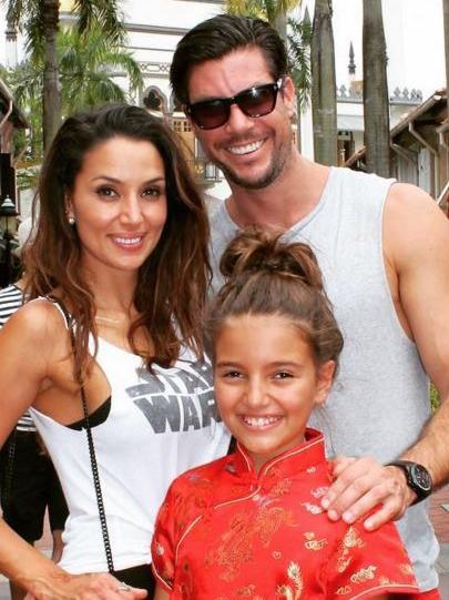 Sam Wood and his wife Snezana are pictured in a throwback photo with daughter Eve. Picture: Instagram