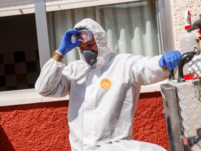 A member of the Military Emergencies Unit (UME) carries out a general disinfection at a home for people with disabilities in Madrid. Picture: AFP