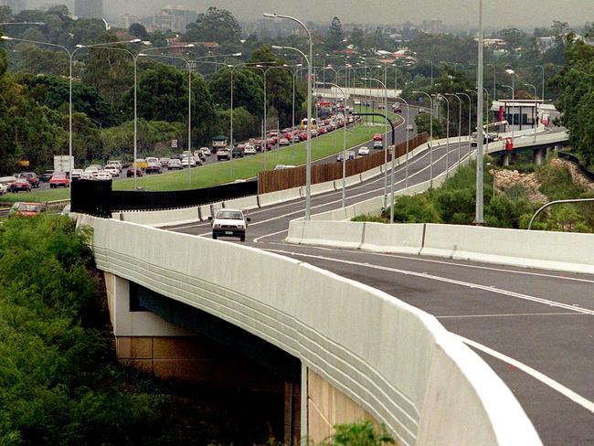 Brisbane’s South East Busway ahead of its opening in 2001, with the congested South East Freeway (now Pacific Motorway) in the background