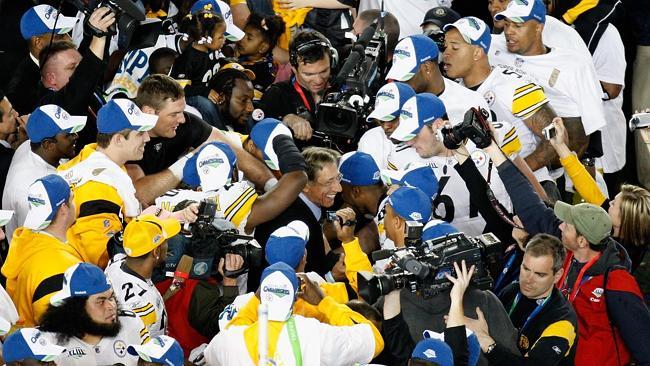 American football great ... The Pittsburgh Steelers mob Joe Namath as he carries in the Vince Lombardi trophy after the Steelers won 27-23 against the Arizona Cardinals during Super Bowl XLIII on February 1, 2009. Picture: Doug Benc/Getty Images/AFP