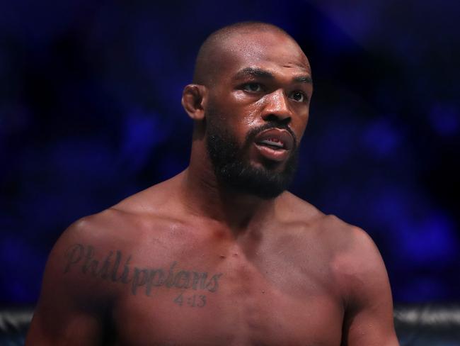 (FILES) In this file photo taken on July 6, 2019, Jon Jones of the United States looks on prior to his UFC Light Heavyweight Title bout against Thiago Santos of Brazil at the T-Mobile Arena in Las Vegas, Nevada. - French Ciryl Gane is set to fight against MMA legend Jon Jones in an attempt to get the UFC heavyweight belt. (Photo by Sean M. Haffey / GETTY IMAGES NORTH AMERICA / AFP)