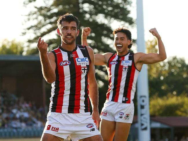 ADELAIDE, AUSTRALIA – APRIL 07: Riley Bonner celebrates a goal with Mitch Owens at Norwood Oval. Picture: Sarah Reed/AFL Photos via Getty Images.