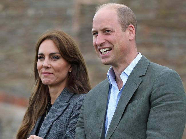 Britain's Prince William, Prince of Wales and Britain's Catherine, Princess of Wales react during a visit to Kings Pitt Farm in Hereford, western England, on September 14, 2023. (Photo by Cameron Smith / POOL / AFP)