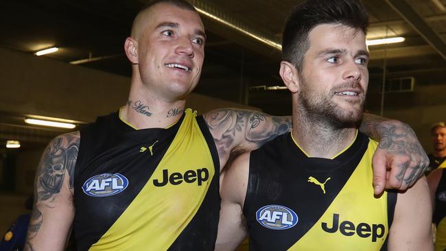 Dustin Martin and Trent Cotchin in the rooms after a Richmond win.