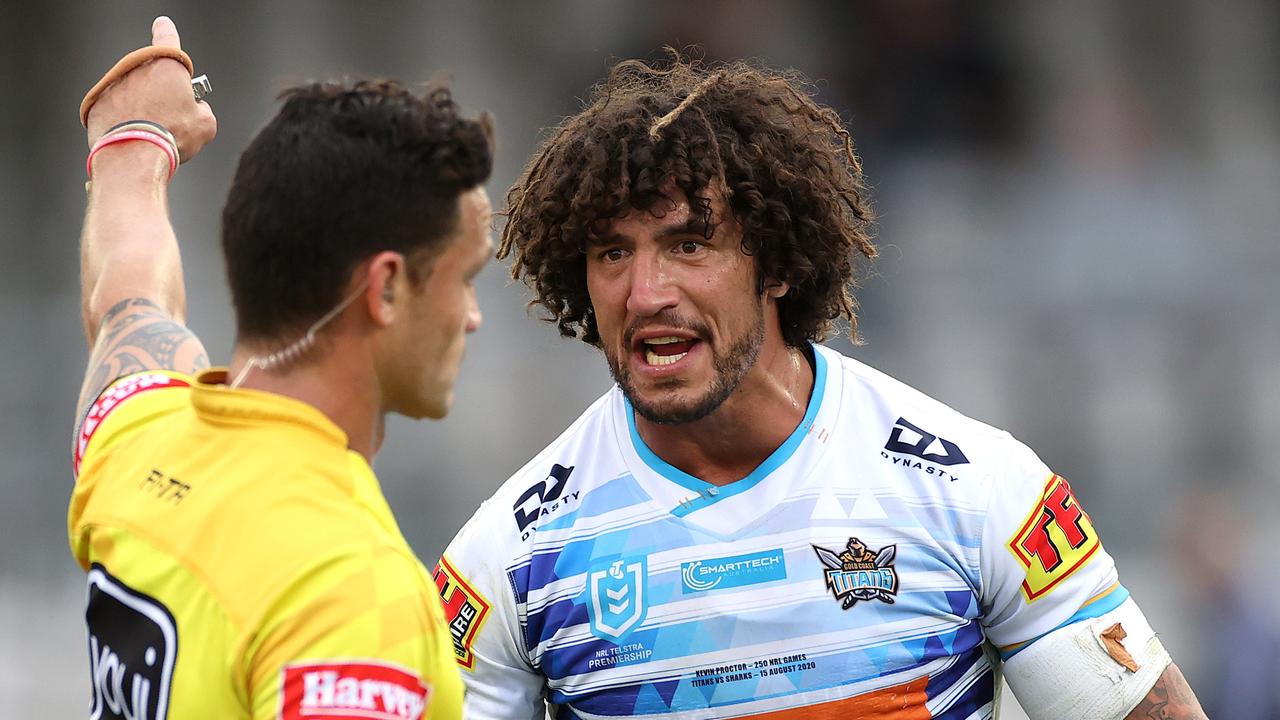 Titans' captain Kevin Proctor is sent from the field after he bit Cronulla's Shaun Johnson.