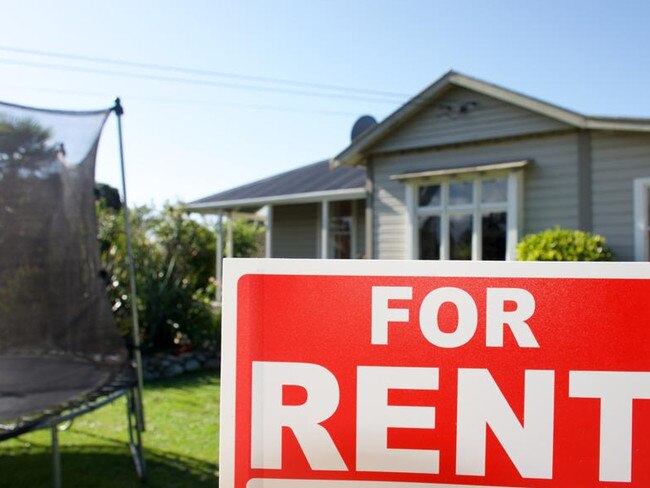 A For Rent Sign Outside a House.