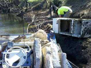 Somerset Regional Council is still pulling large items of debris from the Brisbane River more than a year after the flood. . Picture: Contributed