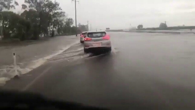 Tropical Storm Floods Roads in Northern Queensland