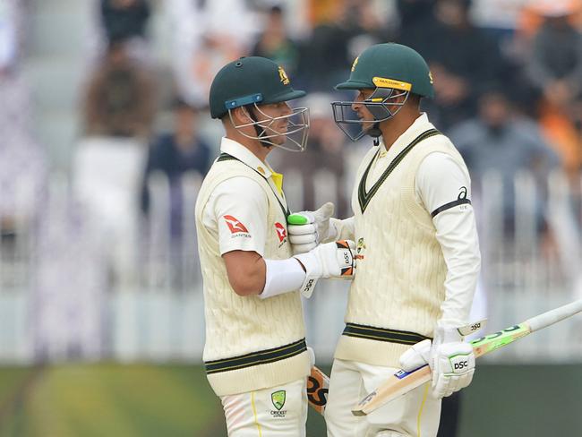 Usman Khawajaand David Warner both scored half-centuries on the third day of the first Test against Pakistan. Picture: Farooq NAEEM/AFP