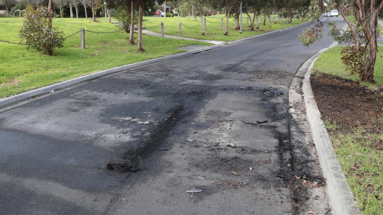 A scorched street in Epping, where the burnt-out getaway car was found. Picture: David Crosling