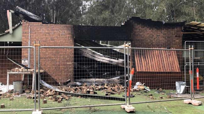 The burnt out remains of the Narrabeen Lakes Sailing Club and Jamieson Park Paddle paddleboard and kayak rental business at Jamieson Park, Narrabeen. Picture: Jim O'Rourke