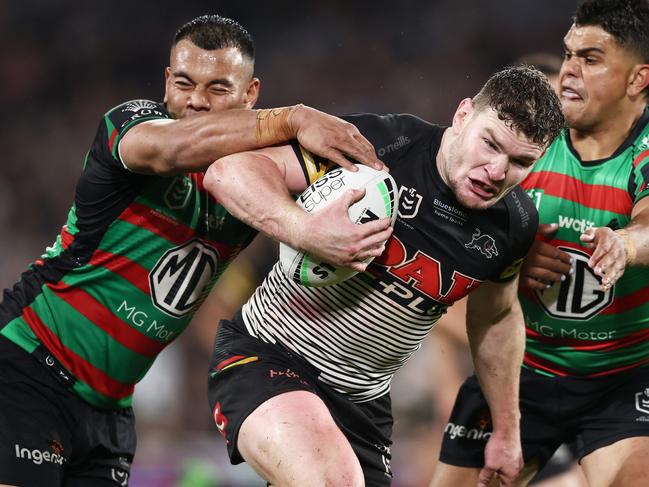 SYDNEY, AUSTRALIA - SEPTEMBER 24:  Liam Martin of the Panthers is tackled by Richard Kennar (L) and Latrell Mitchell (R) of the Rabbitohs during the NRL Preliminary Final match between the Penrith Panthers and the South Sydney Rabbitohs at Accor Stadium on September 24, 2022 in Sydney, Australia. (Photo by Matt King/Getty Images)