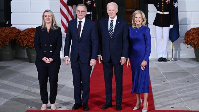 US President Joe Biden (2nd R), First Lady Jill Biden (R), Australia's Prime Minister Anthony Albanese (2nd L) and Jodie Haydon (L) pose for pictures at the South Portico of the White House in Washington, DC on Wednesday.