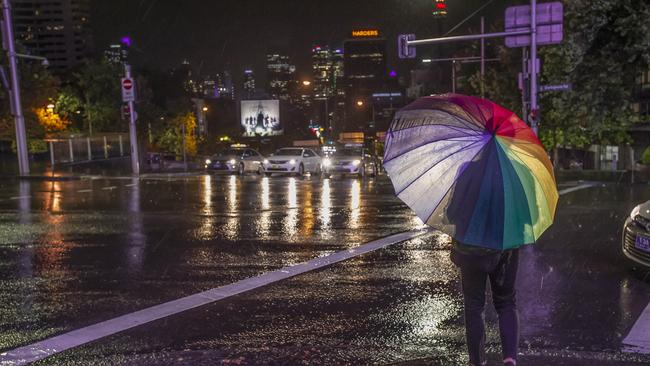 Wet weather in Kings Cross. Picture: Gordon McComiskie